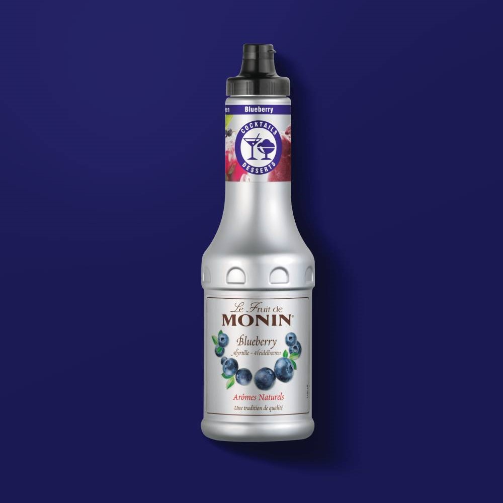 Butelka puree blueberry puree jagodowe 0,5 litra na granatowym tle
